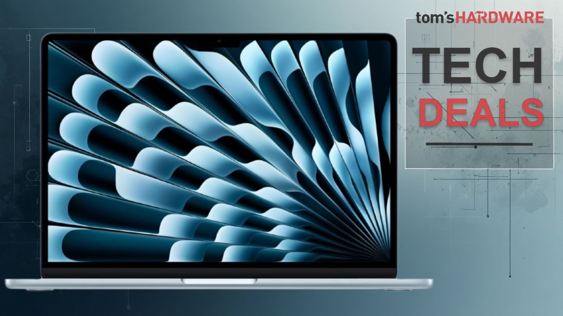 Silver 13-inch M5 MacBook Air on white background with price tag showing $949 discount