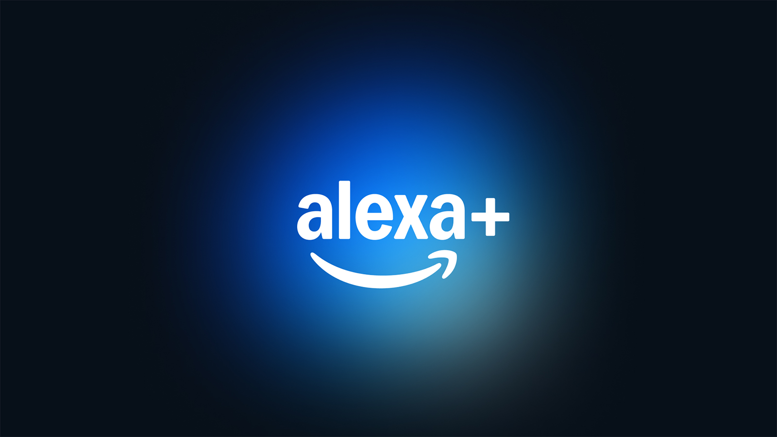 Panos Panay unveiling Alexa+ on stage at Amazon's New York event with glowing Echo devices