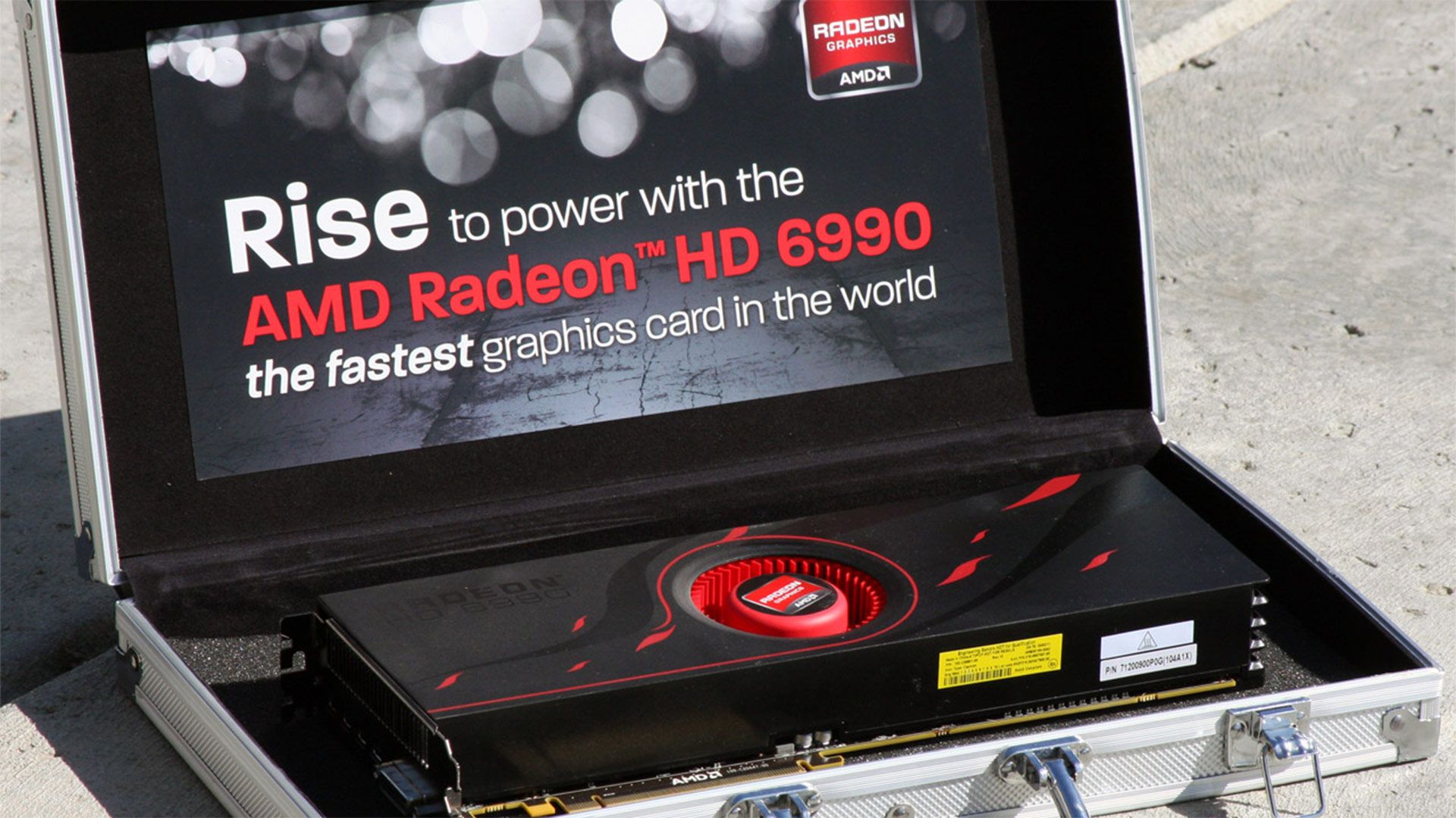 AMD Radeon HD 6990 dual-GPU graphics card with massive heatsink and fans