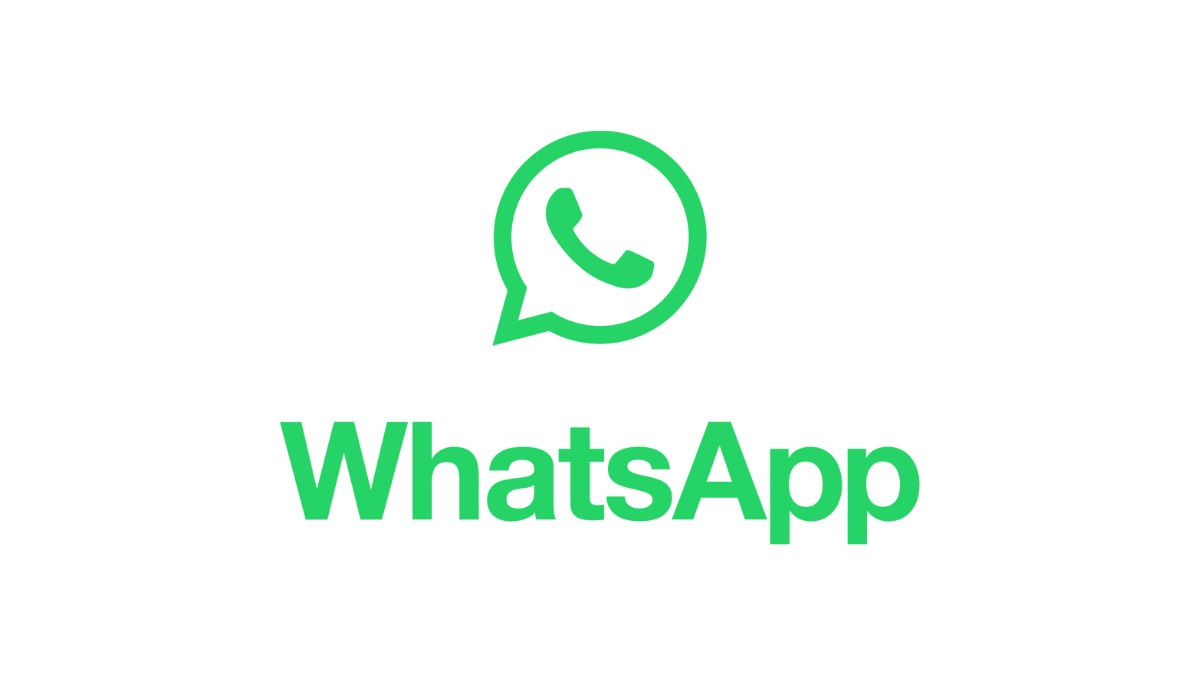 WhatsApp desktop app on Windows with malware warning overlay and attachment icon