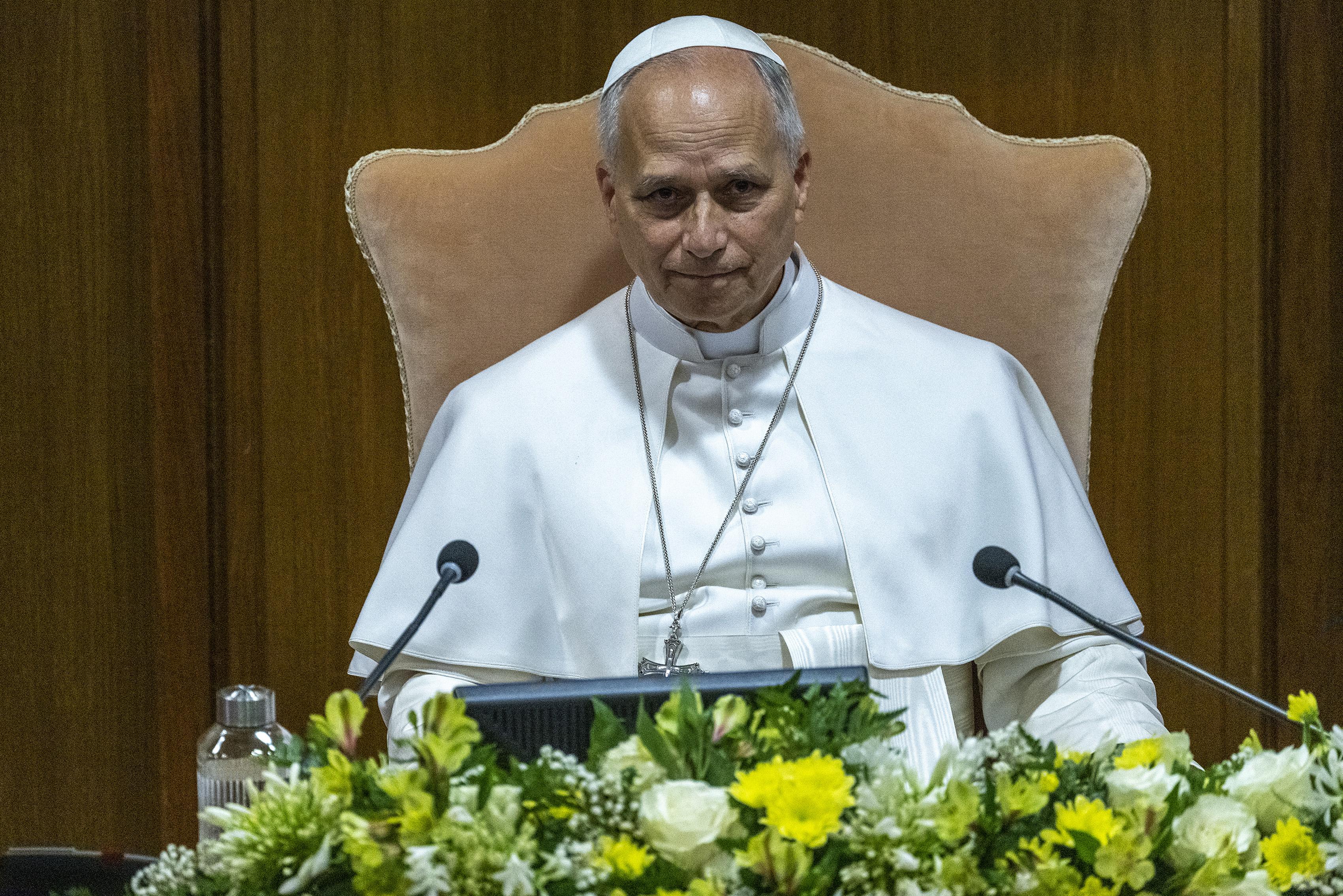Pope Leo XIV holding a document titled Magnifica Humanitas, with abstract AI neural network graphics in the background.