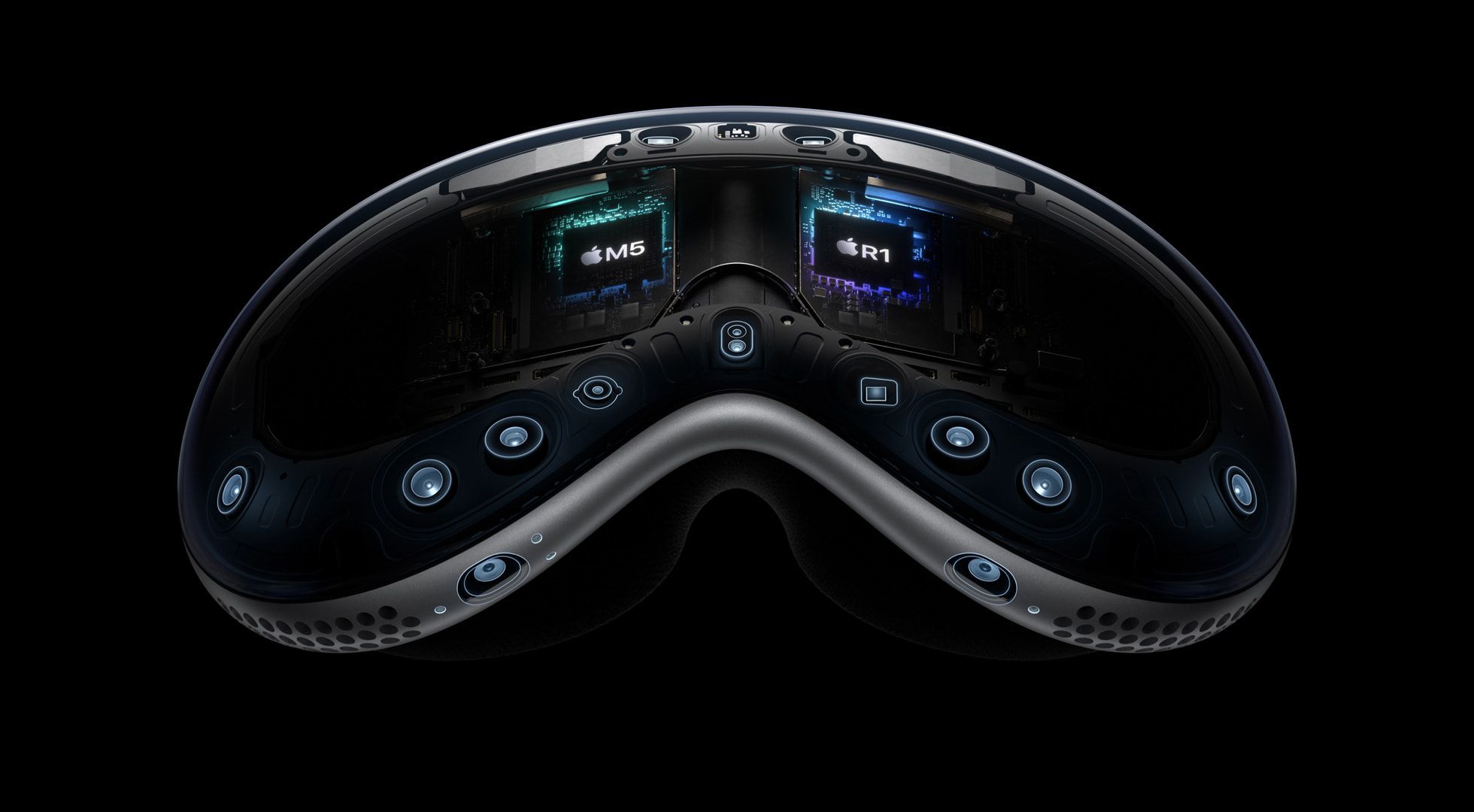 A person wearing the Apple Vision Pro headset, with a subtle glow around the lenses.