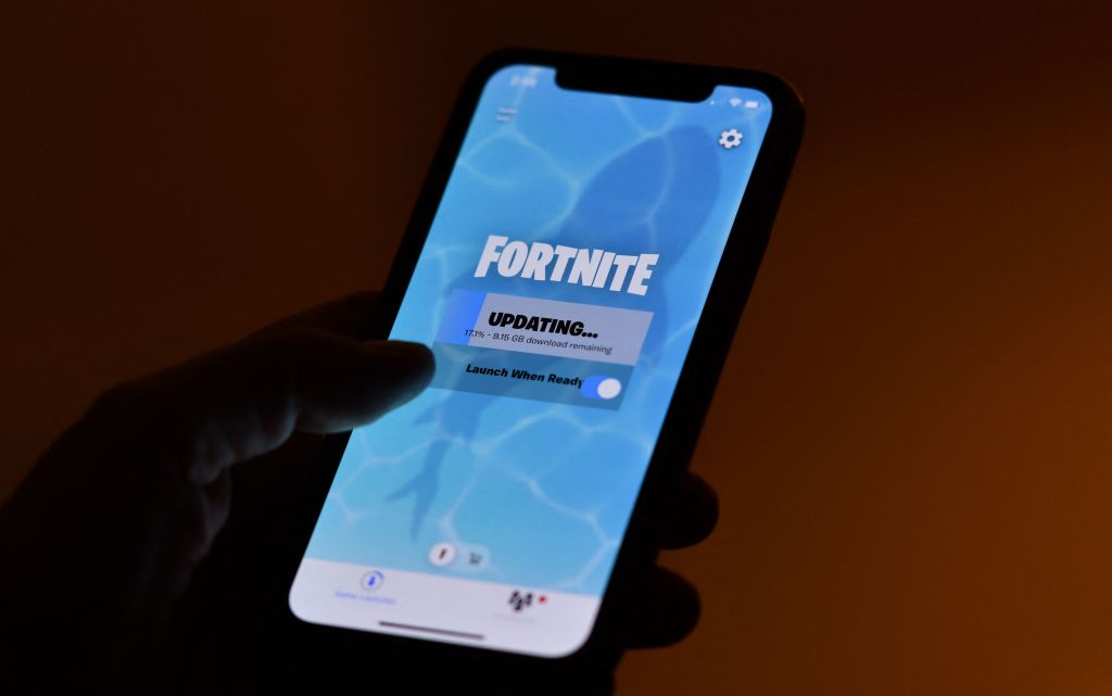 Apple headquarters with Supreme Court pillars and Epic Fortnite logo overlay