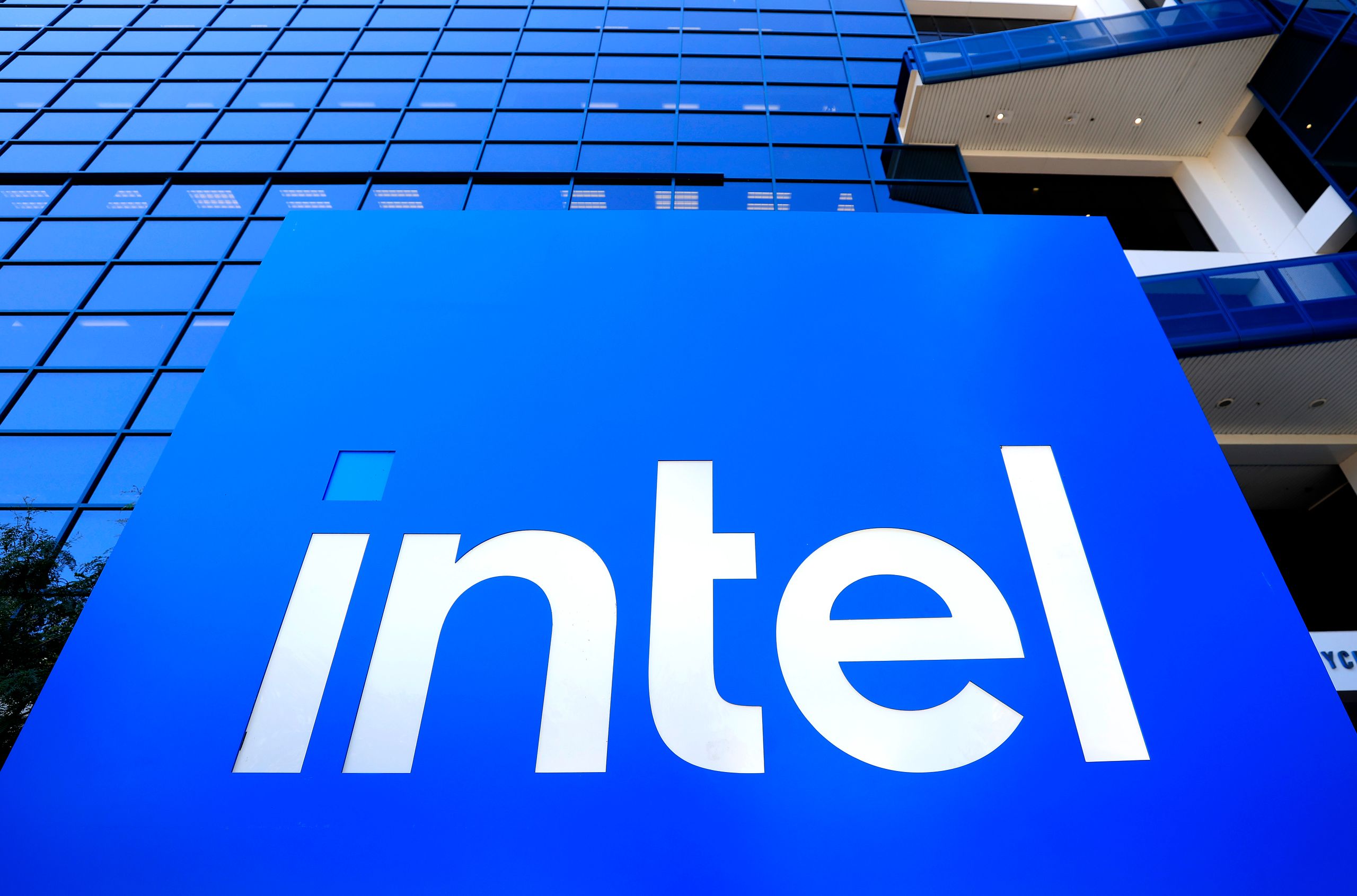 Intel CEO Lip-Bu Tan on stage at a press event.