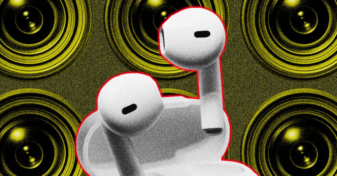 Close-up of Apple AirPods with a subtle hint of a camera lens integrated into the stem.