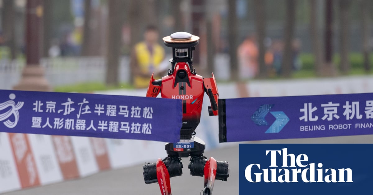 A sleek, humanoid robot in a futuristic setting.