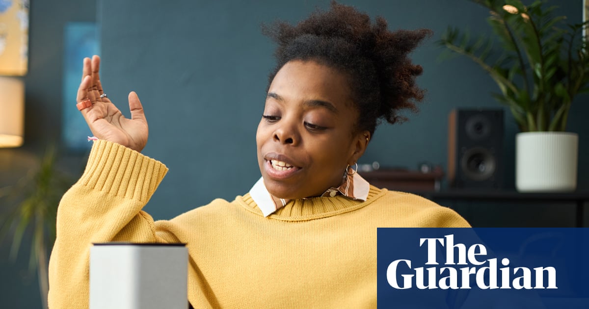 Person speaking politely to smart speaker like Alexa, with skeptical expression