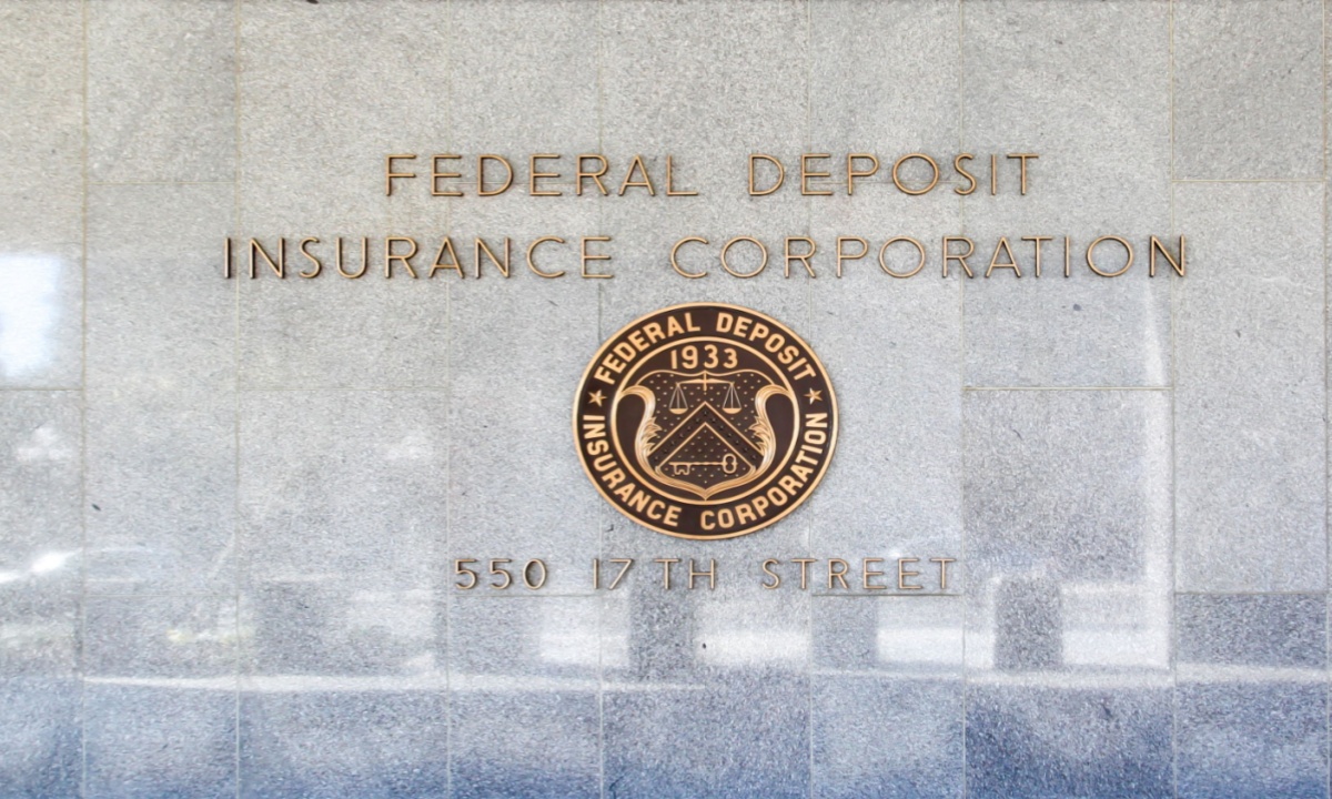 FDIC headquarters overlaid with glowing stablecoin icons and regulatory documents