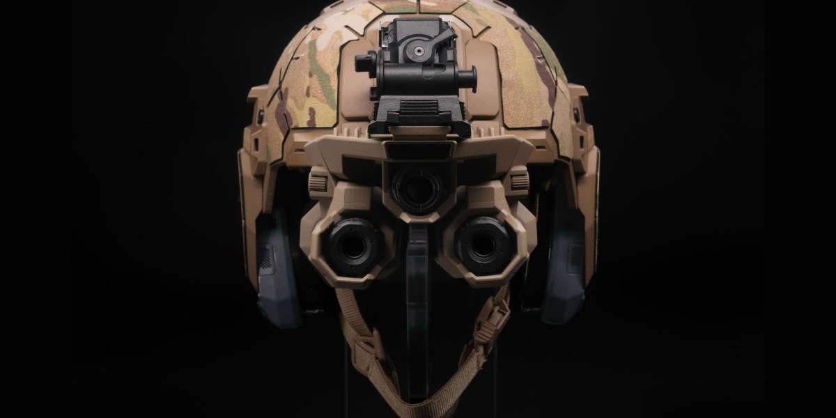 A soldier wearing an augmented reality headset with digital overlays visible.