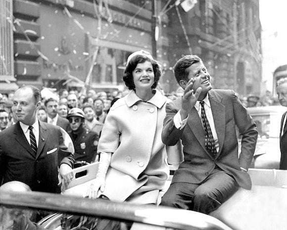 A split image showing President John F. Kennedy speaking at a podium on one side, and a modern abstract representation of artificial intelligence and data on the other.